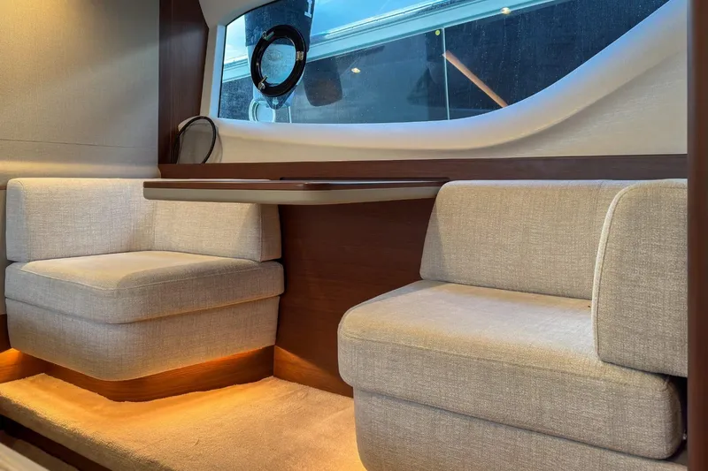  Yacht Photos Pics Luxurious interior of 2019 Princess F55 yacht with elegant seating and modern design.