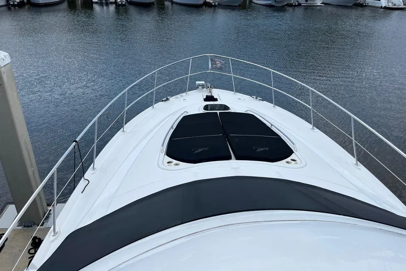 Acrux Yacht Photos Pics 2007 Sea Ray 52 Sedan Bridge yacht bow view at marina.