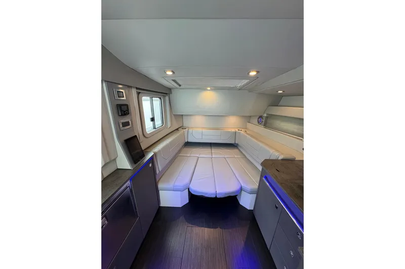  Yacht Photos Pics Luxurious interior of 2018 Formula 430 Super Sport Crossover with modern seating and ambient lighting.