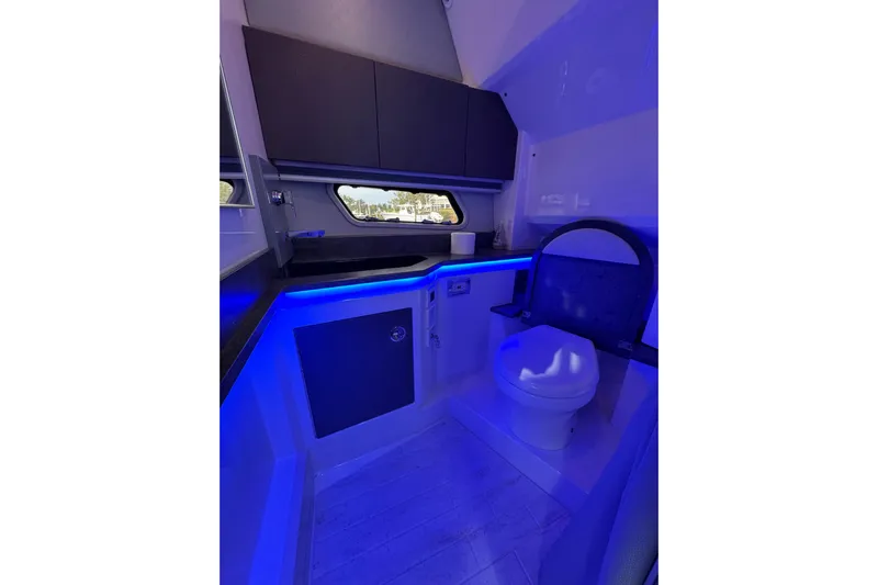  Yacht Photos Pics Luxurious bathroom in 2018 Formula 430 Super Sport Crossover with modern blue lighting.