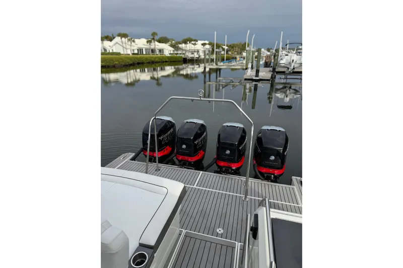  Yacht Photos Pics 2018 Formula 430 Super Sport Crossover with four powerful outboard engines docked at marina.