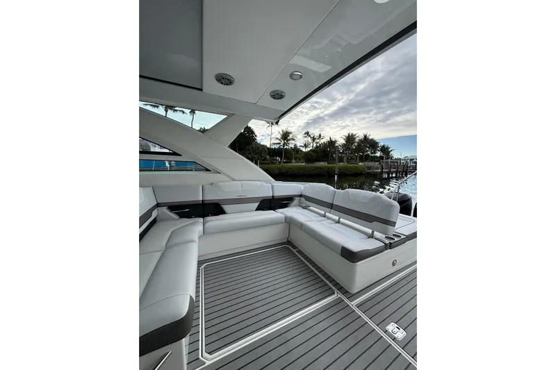  Yacht Photos Pics 2018 Formula 430 Super Sport Crossover yacht interior with luxurious seating and scenic marina view.