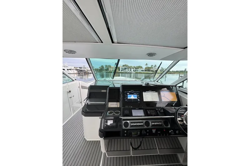  Yacht Photos Pics 2018 Formula 430 Super Sport Crossover helm with advanced navigation displays.