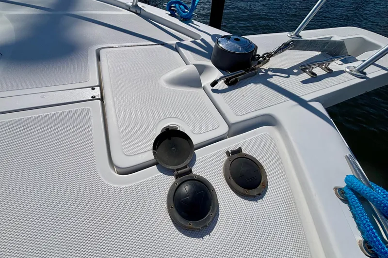  Yacht Photos Pics Deck of 2002 Luhrs 32 Open boat with anchor and rope details.