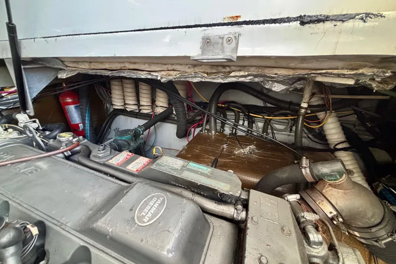  Yacht Photos Pics Engine compartment of a 2002 Luhrs 32 Open boat, showcasing mechanical components.