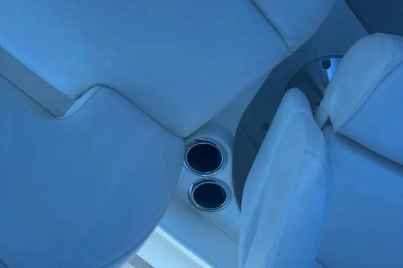  Yacht Photos Pics Interior seating and cup holders on a 2002 Sea Ray 360 Sundancer boat.