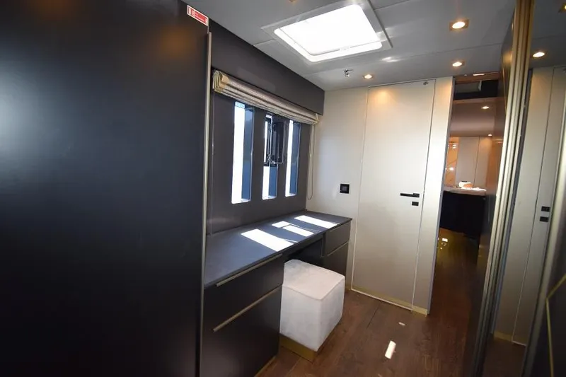 Welcome Back Yacht Photos Pics Luxurious interior of 2019 Sunreef 50 yacht with modern design and natural lighting.