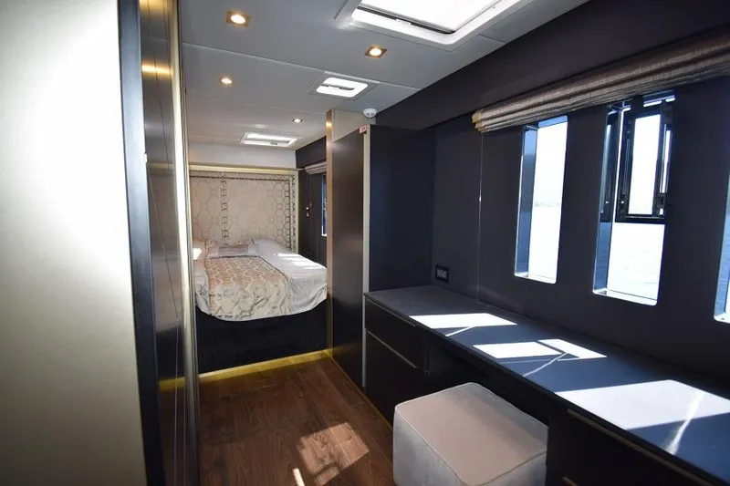 Welcome Back Yacht Photos Pics Luxurious interior of 2019 Sunreef 50 yacht with modern bedroom and sleek design.