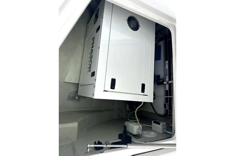  Yacht Photos Pics Engine compartment of a 2016 Leopard 44 yacht, featuring a Phasor generator.