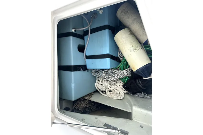  Yacht Photos Pics Storage compartment of 2016 Leopard 44 boat with ropes, buoys, and equipment.