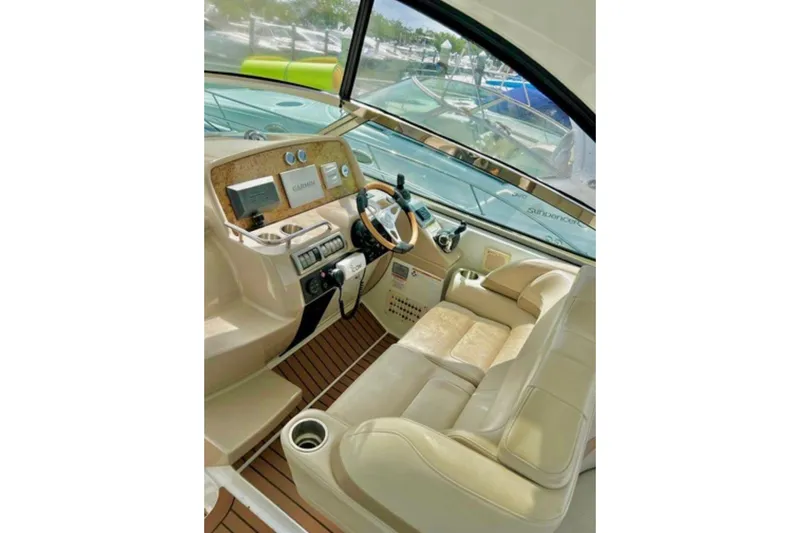  Yacht Photos Pics Luxurious 2011 Formula 37 PC yacht cockpit with leather seating and modern controls.
