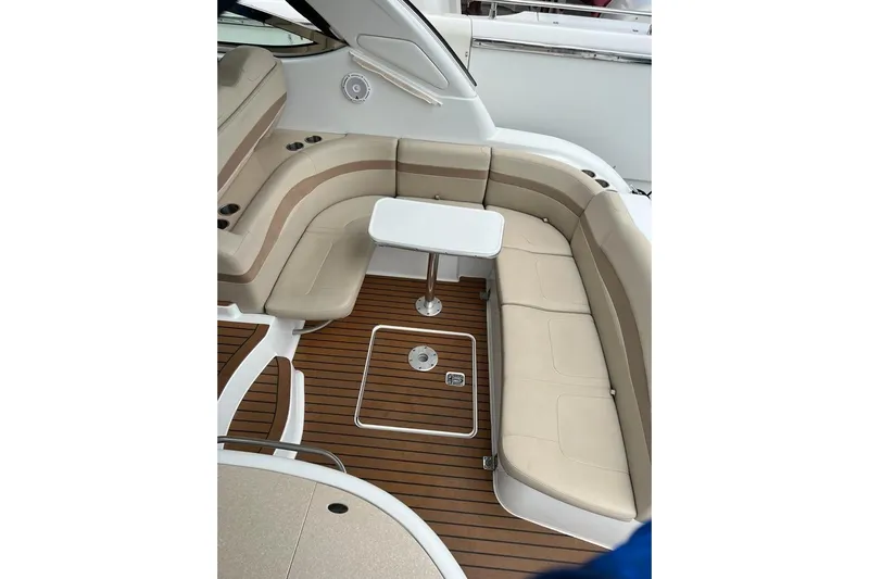  Yacht Photos Pics 2011 Formula 37 PC yacht interior with beige seating and wooden flooring.