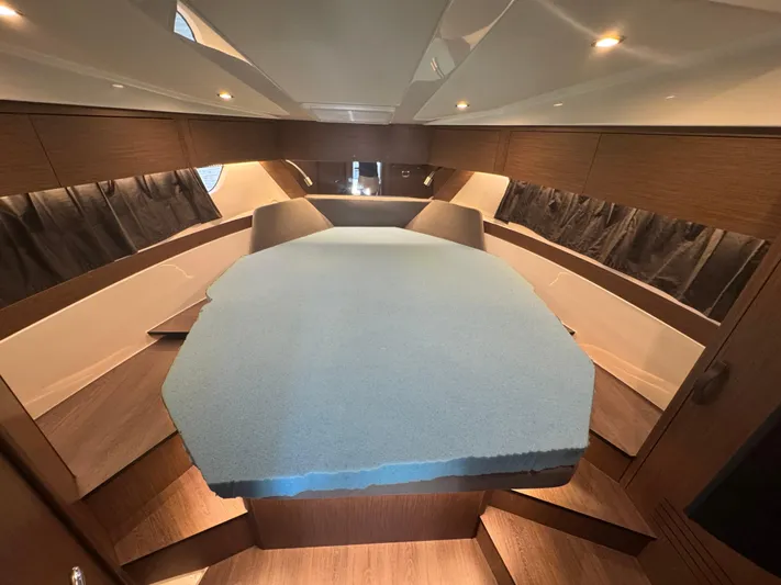  Yacht Photos Pics Luxurious interior cabin of 2024 Beneteau Antares 11 yacht with modern design.