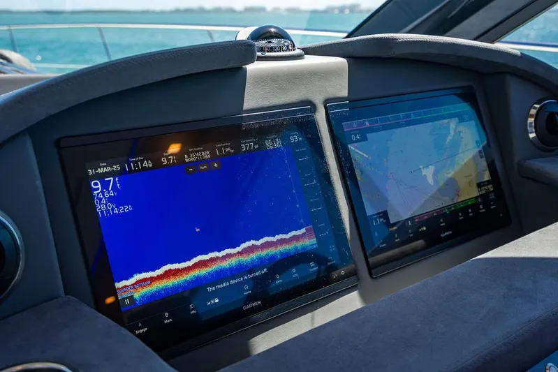 Bald Eagle Yacht Photos Pics Dashboard of 2024 Riviera 6000SY yacht with advanced navigation displays.