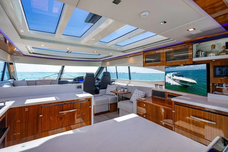 Bald Eagle Yacht Photos Pics Luxurious interior of 2024 Riviera 6000SY yacht with modern design and ocean view.