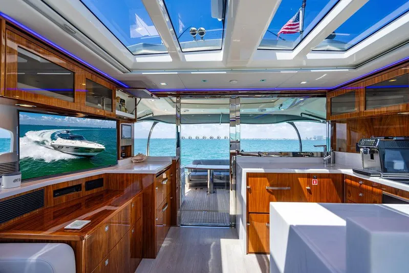 Bald Eagle Yacht Photos Pics Luxurious interior of 2024 Riviera 6000SY yacht with ocean view and modern amenities.