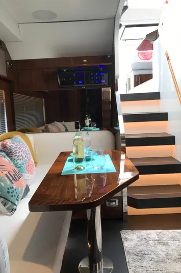 Yacht Photos Pics Interior of 2021 Fairline Targa 45 GT yacht with modern seating and elegant table.