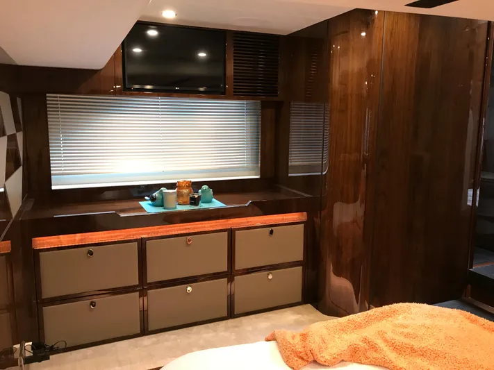  Yacht Photos Pics Luxurious interior of 2021 Fairline Targa 45 GT yacht with sleek wood finishes.