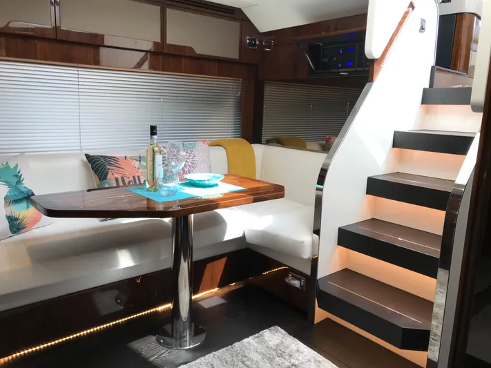  Yacht Photos Pics Luxurious interior of 2021 Fairline Targa 45 GT yacht with elegant seating and staircase.