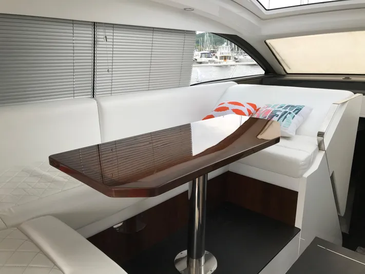  Yacht Photos Pics Interior of 2021 Fairline Targa 45 GT yacht with sleek seating and modern table design.