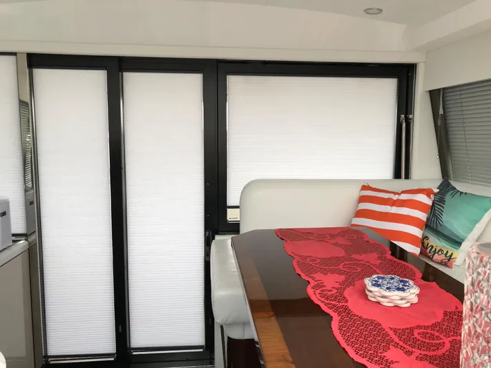  Yacht Photos Pics Interior of 2021 Fairline Targa 45 GT yacht with modern decor and cozy seating area.