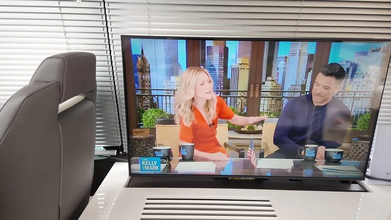  Yacht Photos Pics TV screen inside 2021 Fairline Targa 45 GT yacht showing a talk show.