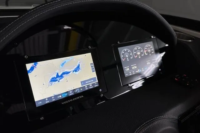  Yacht Photos Pics 2023 Regal 2800 Bowrider dashboard with navigation and control screens.