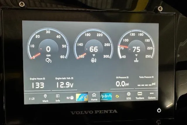  Yacht Photos Pics Dashboard of 2023 Regal 2800 Bowrider showing engine metrics and Volvo Penta display.