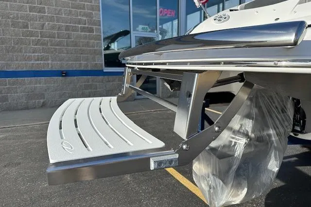 Yacht Photos Pics 2023 Regal 2800 Bowrider swim platform, stainless steel and white finish, outdoor display.