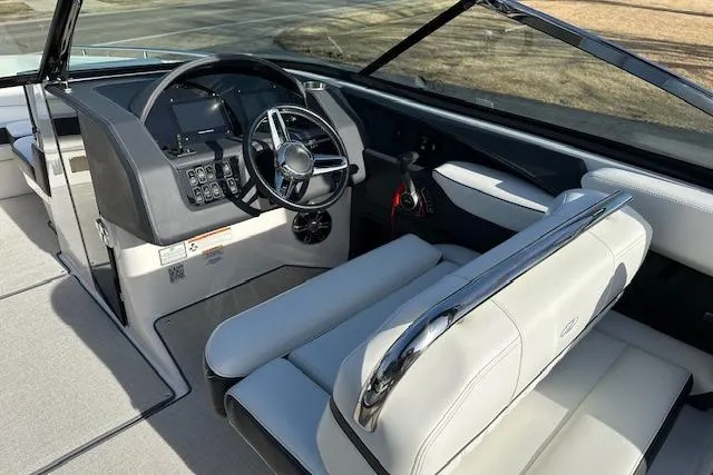  Yacht Photos Pics 2023 Regal 2800 Bowrider interior with sleek dashboard and comfortable seating.