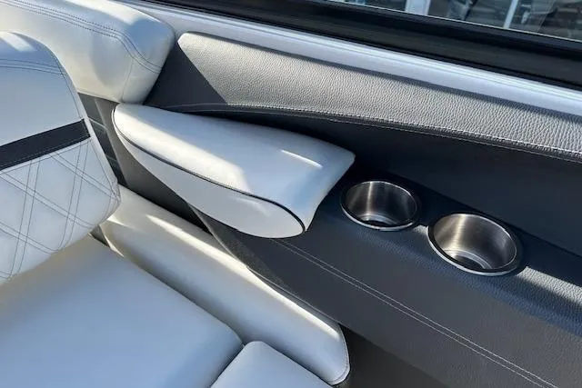  Yacht Photos Pics 2023 Regal 2800 Bowrider interior with white leather seats and dual cup holders.