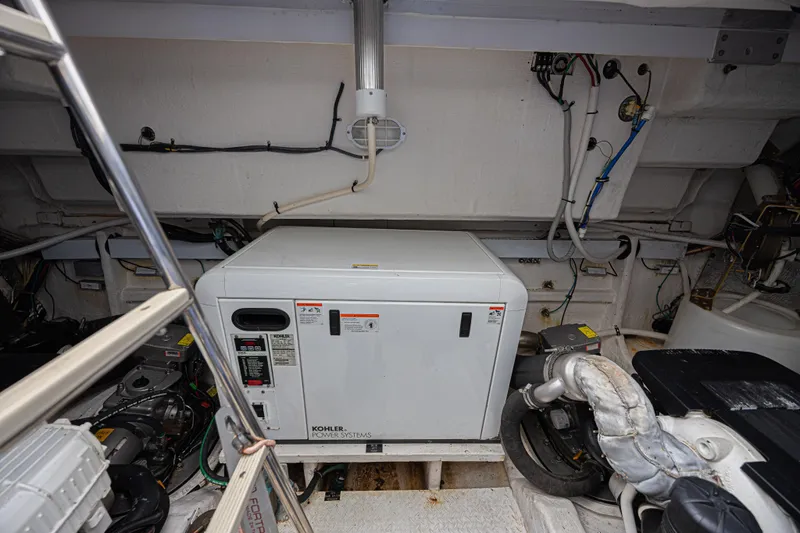 Low Hours!!! Yacht Photos Pics Engine room of 2012 Cruisers Yachts 48 Cantius with Kohler power system.