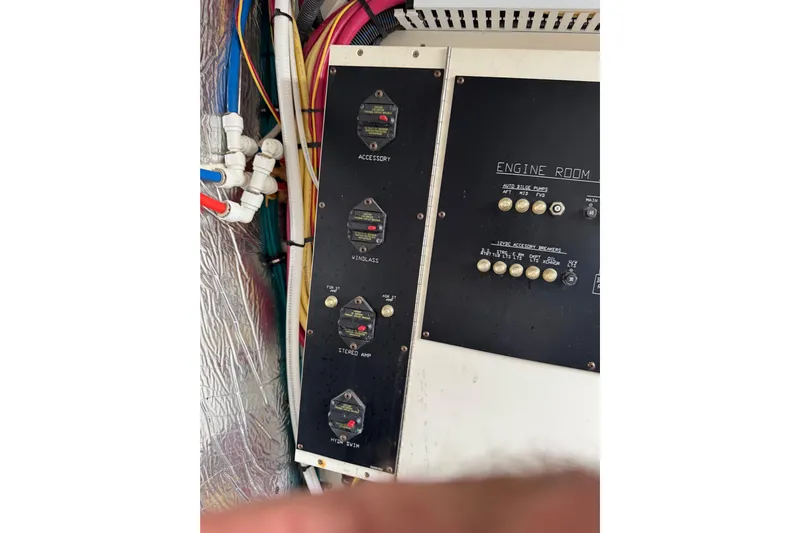 Low Hours!!! Yacht Photos Pics Engine room control panel of 2012 Cruisers Yachts 48 Cantius with switches and wiring.