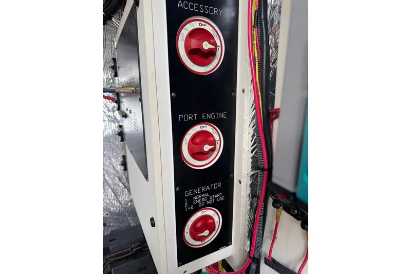 Low Hours!!! Yacht Photos Pics Control panel with red switches on a 2012 Cruisers Yachts 48 Cantius.