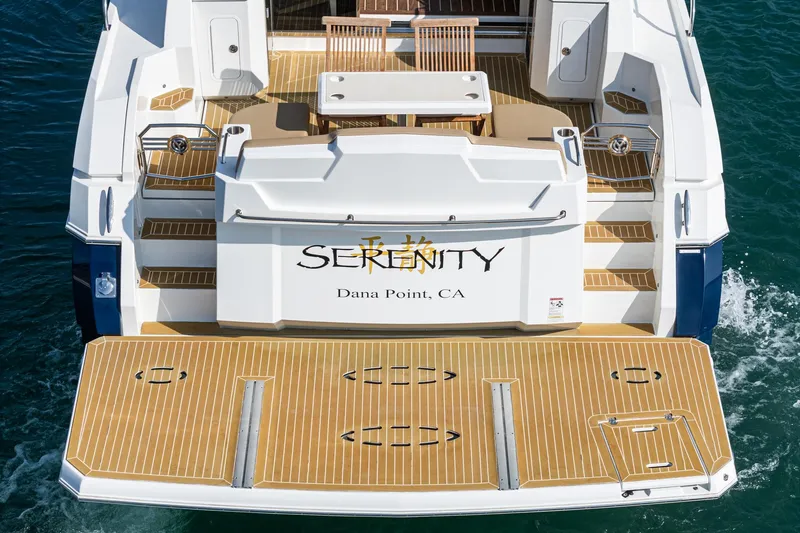 Serenity Yacht Photos Pics 2015 Cruisers Yachts 48 Cantius, rear view, docked at Dana Point, CA.