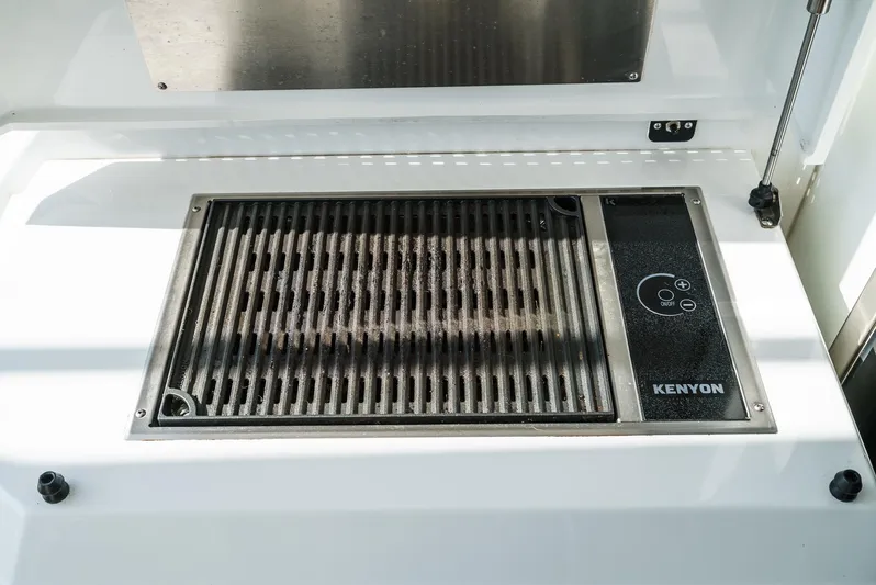Serenity Yacht Photos Pics Built-in Kenyon grill on 2015 Cruisers Yachts 48 Cantius.