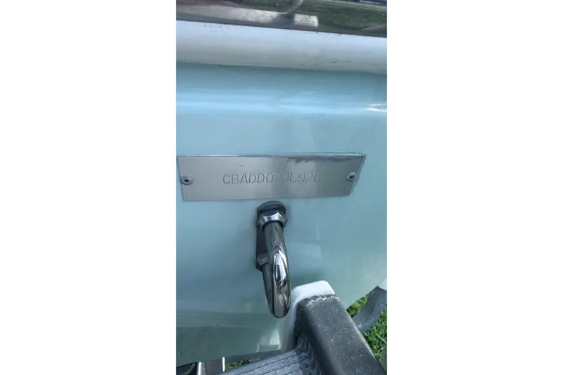Hey Babe Yacht Photos Pics 2020 Cobia 280DC boat hull identification number plate with metal fittings.