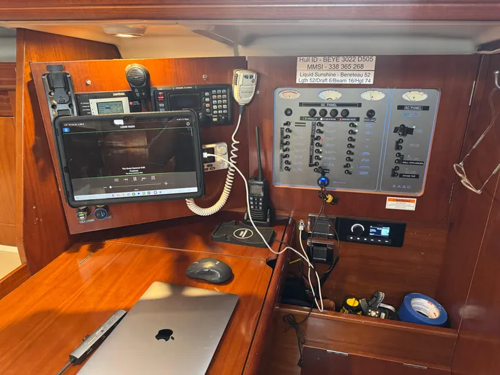 Liquid Sunshine Yacht Photos Pics Navigation station of 2005 Beneteau 523 Oceanis with electronics and control panels.