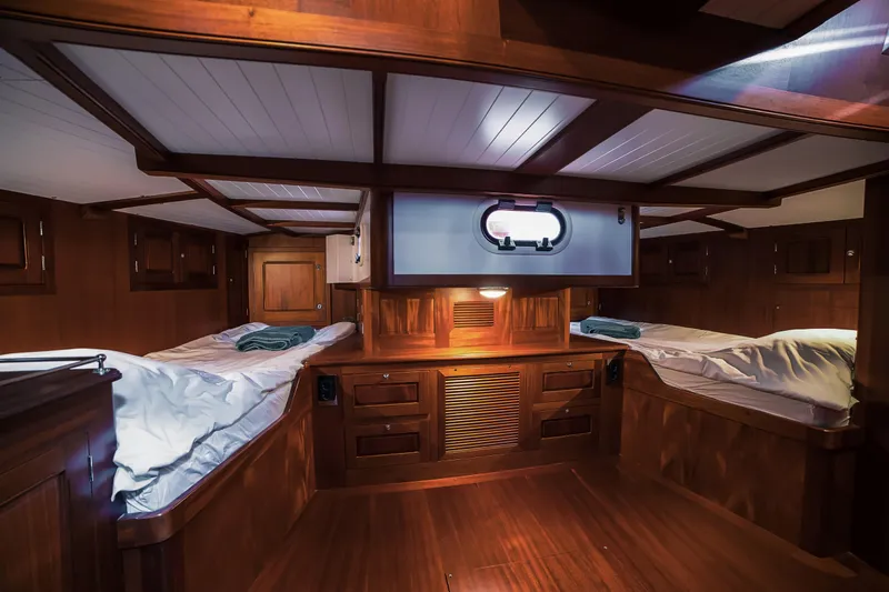 Spirit Of Galatea Yacht Photos Pics Luxurious 2014 Spirit Yachts cabin interior with wooden finish and cozy beds.