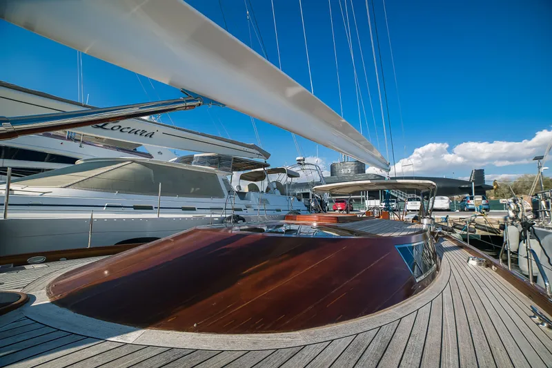 Spirit Of Galatea Yacht Photos Pics 2014 Spirit Yachts sailboat docked, showcasing sleek wooden deck and modern design.