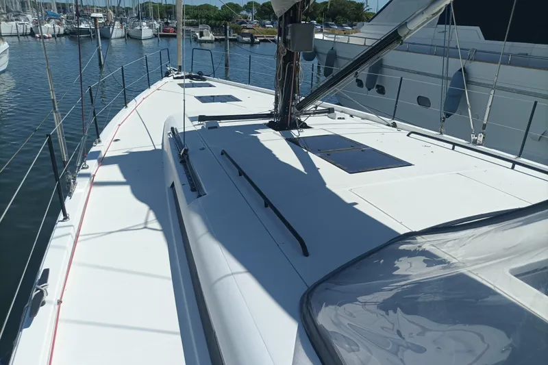 Ritual Yacht Photos Pics 2020 Beneteau First 53 sailboat deck view in marina setting.