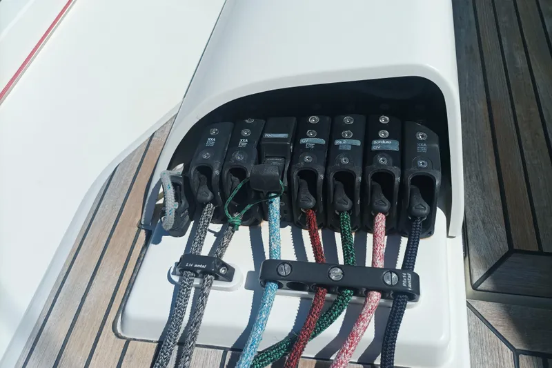 Ritual Yacht Photos Pics Control lines on a 2020 Beneteau First 53 yacht, featuring multiple rope clutches.