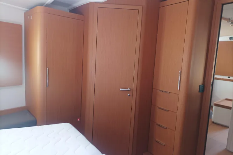 Ritual Yacht Photos Pics Interior of 2020 Beneteau First 53 yacht with wooden cabinetry and modern design.