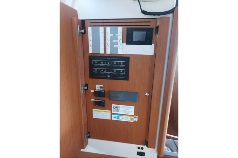 Ritual Yacht Photos Pics Control panel inside 2020 Beneteau First 53 yacht, featuring switches and display.