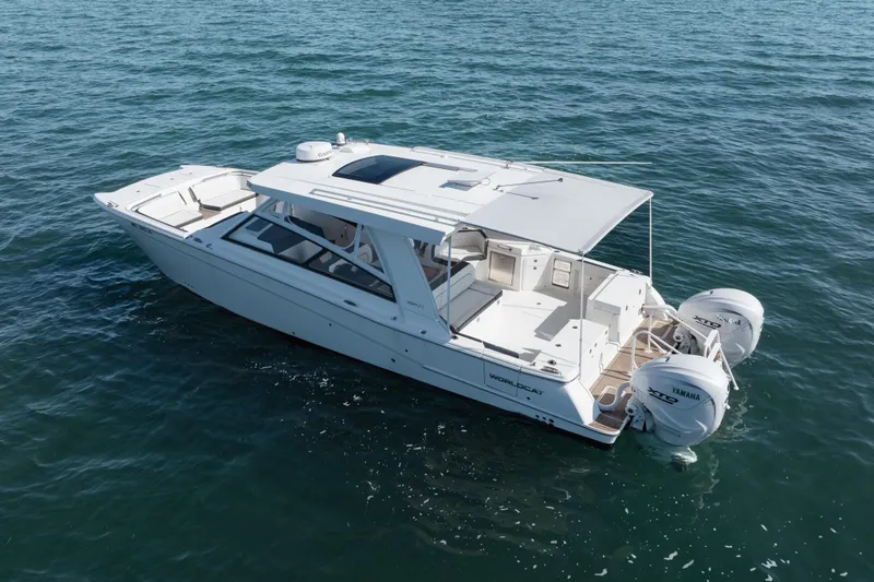  Yacht Photos Pics 2024 World Cat 400 DC-X boat on open water, featuring dual Yamaha engines.