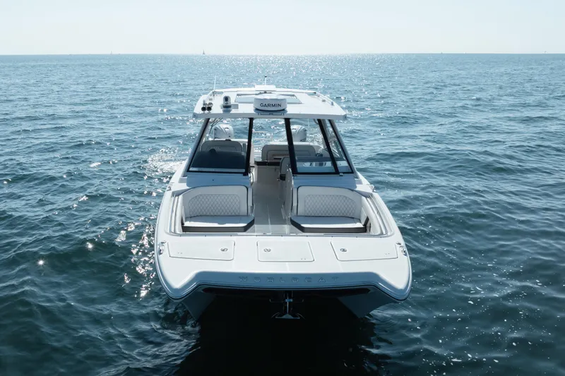 Yacht Photos Pics 2024 World Cat 400 DC-X boat on open water, showcasing sleek design and luxury features.