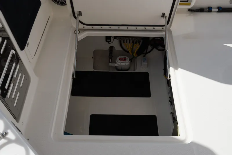  Yacht Photos Pics 2024 World Cat 400 DC-X boat storage compartment with open hatch.