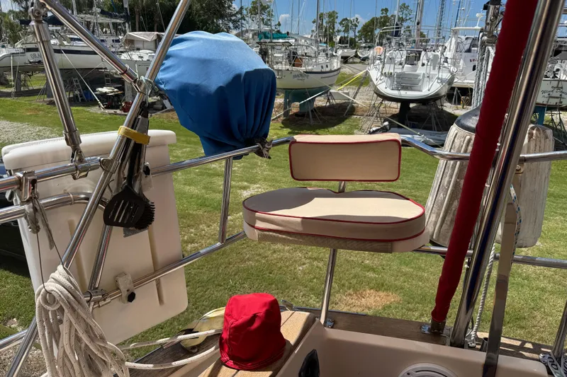 True North Yacht Photos Pics 2004 Island Packet 420 sailboat deck with seating and marina view.