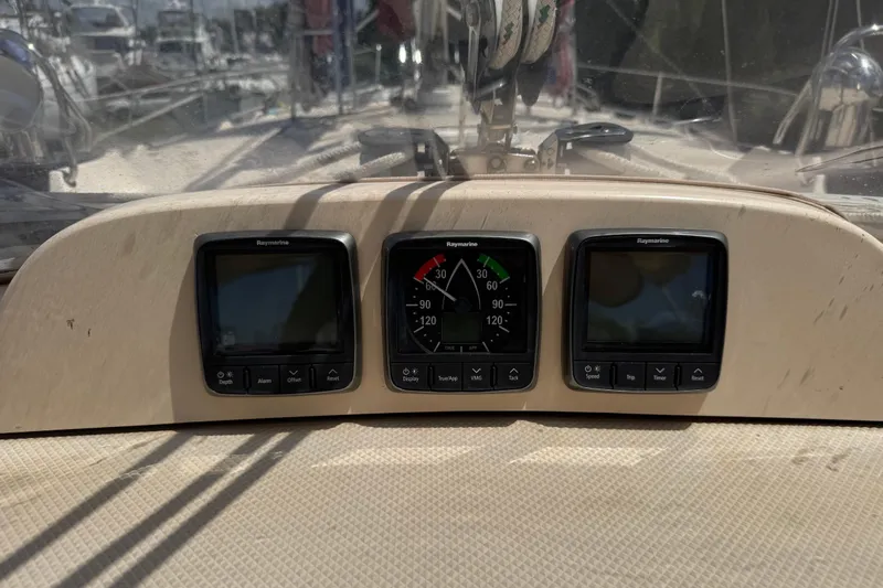 True North Yacht Photos Pics Raymarine instrument panel on 2004 Island Packet 420 sailboat, displaying navigation data.