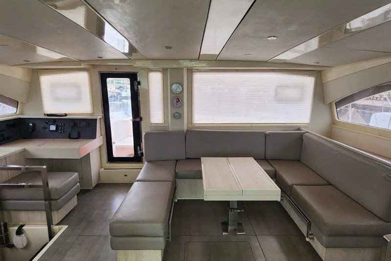 Jolly Dacha Yacht Photos Pics Luxurious interior of a 2015 Leopard 48 yacht with spacious seating and modern design.